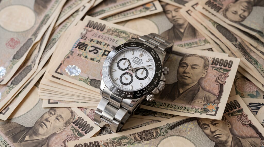 1万円札とデイトナ